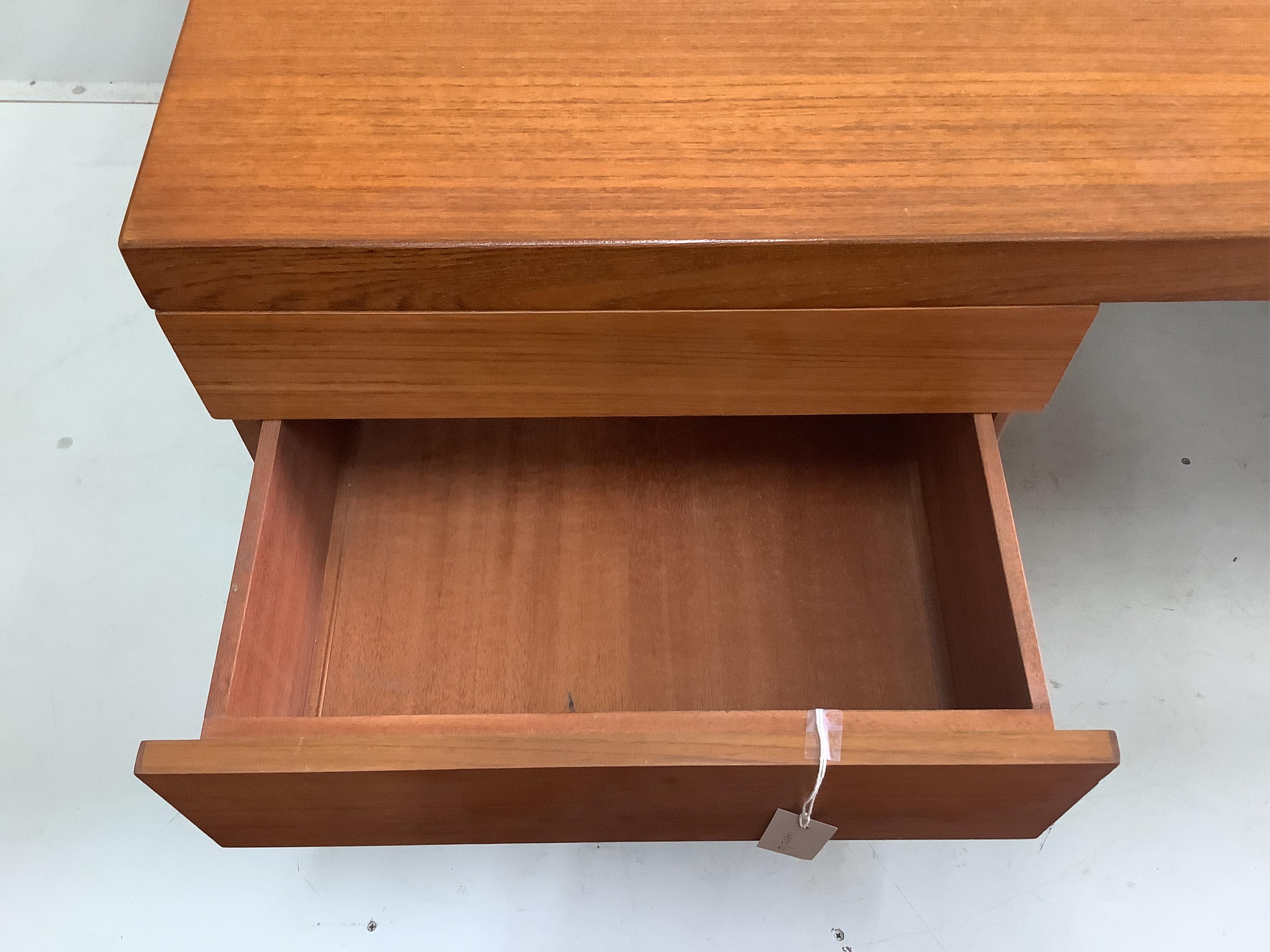 Alfred Cox, a mid century teak kneehole desk, width 92cm, height 71cm. Condition - good